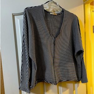 Neckline, sassy navy and white strips. Long sleeves. Sexy look! neck to tail 23”